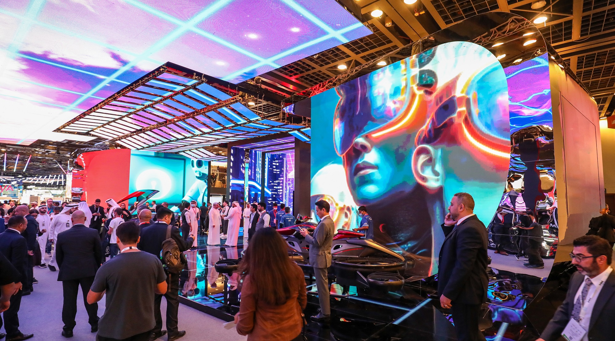 GITEX Global Crowds exploring futuristic tech exhibits at GITEX Dubai 2025, featuring vibrant LED displays, AI showcases, and startup innovations.